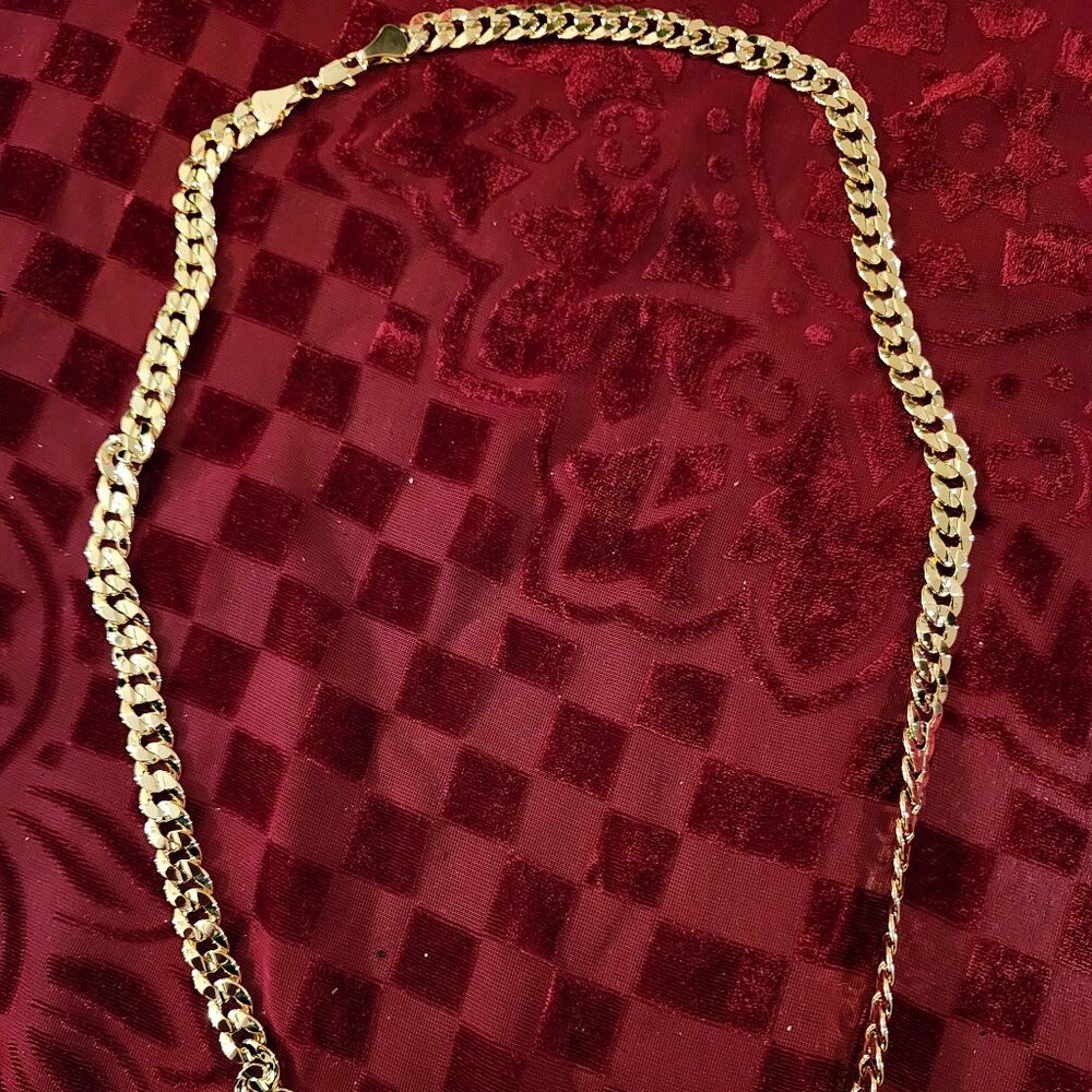 Solid Gold plated 14K Italy chain.